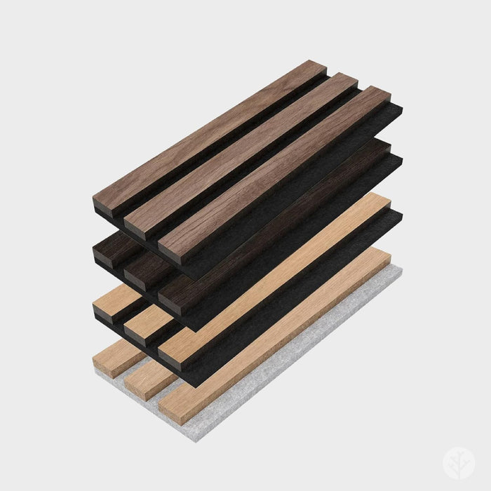 Stack of wooden and black slats on a gray surface with a white background