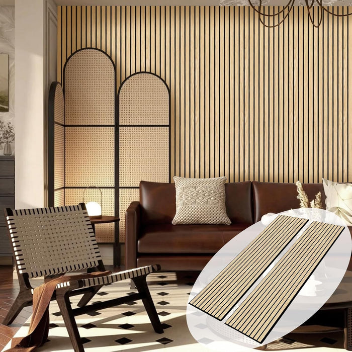 Modern living room with a brown sofa, wicker chair, and decorative wall art.