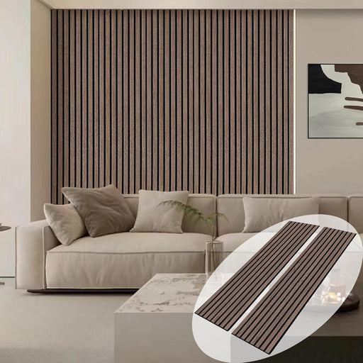 Beige sofa with striped wall and coffee table in a living room setting
