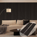 Modern living room with a sectional sofa and decorative rug.