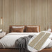 American white oak acoustic slat wood wall panels installed behind bed in modern bedroom interior