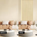 Wall transformation with Unisoar oak slat panels added above neutral-tone sofa