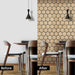 Before and after comparison of dining room wall with and without oak hexagon sound absorbing panels
