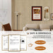 Living room with beige sofa, striped wallpaper, and framed pictures. Certifications and safety information displayed.